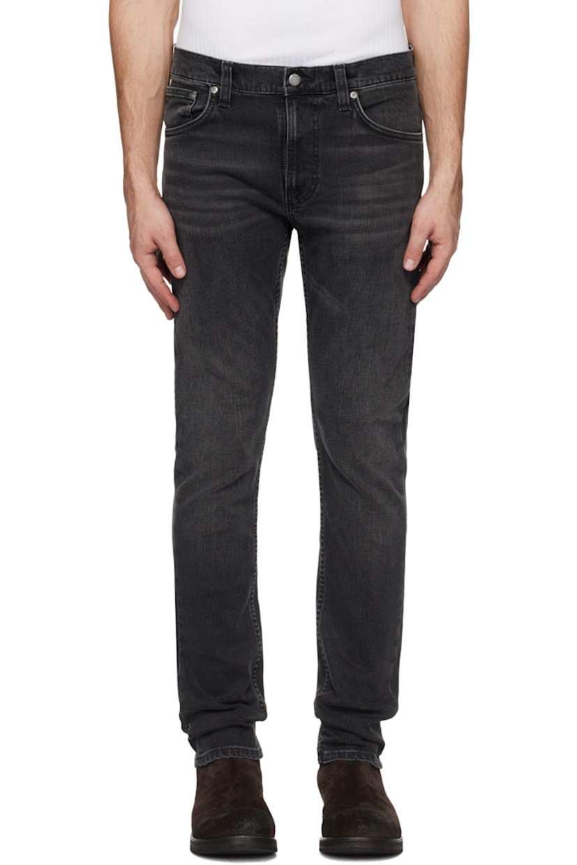 Slim-fit and tapered 11.75 oz stretch denim jeans. Fading and whiskering throughout.

· Mid-rise
· Belt loops
· Five-pocket styling
· Button-fly
· Jacron logo patch at back waistband
· Logo patch at back pocket
· Logo-engraved antiqued silver-tone hardware

Supplier color: Black eyes