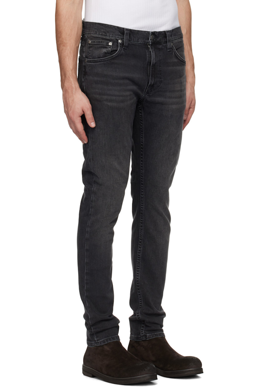 Slim-fit and tapered 11.75 oz stretch denim jeans. Fading and whiskering throughout.

· Mid-rise
· Belt loops
· Five-pocket styling
· Button-fly
· Jacron logo patch at back waistband
· Logo patch at back pocket
· Logo-engraved antiqued silver-tone hardware

Supplier color: Black eyes