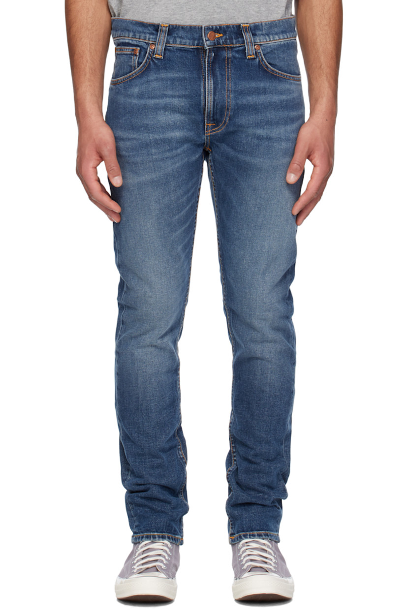 Tapered 13 oz stretch organic cotton denim jeans. Fading and whiskering throughout.

· Slim-fit
· Mid-rise
· Belt loops
· Five-pocket styling
· Zip fly
· Jacron logo patch at back waistband
· Logo patch at back pocket
· Topstitching at back pockets
· Logo-engraved copper-tone hardware
· Contrast stitching in tan

Supplier color: Troubled sea