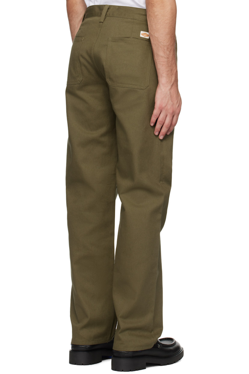 Loose-fit and wide-leg 9.4 oz organic cotton twill trousers.

· High-rise
· Belt loops
· Four-pocket styling
· Button-fly
· Logo patch at back waistband
· Logo-engraved corozo hardware

Supplier color: Green