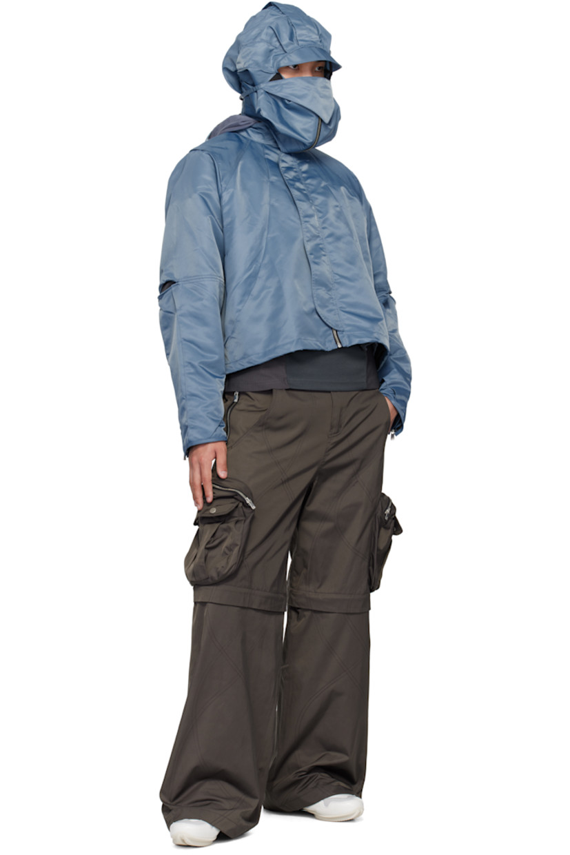 Nylon twill jacket. Tucks throughout.

· Pleats and self-tie strap at detachable hood
· Funnel neck
· Zip closure
· Bungee-style drawstring at hem
· Underwire at elbows
· Zip expansion panel at cuffs
· Full cupro satin lining

Supplier color: Light blue