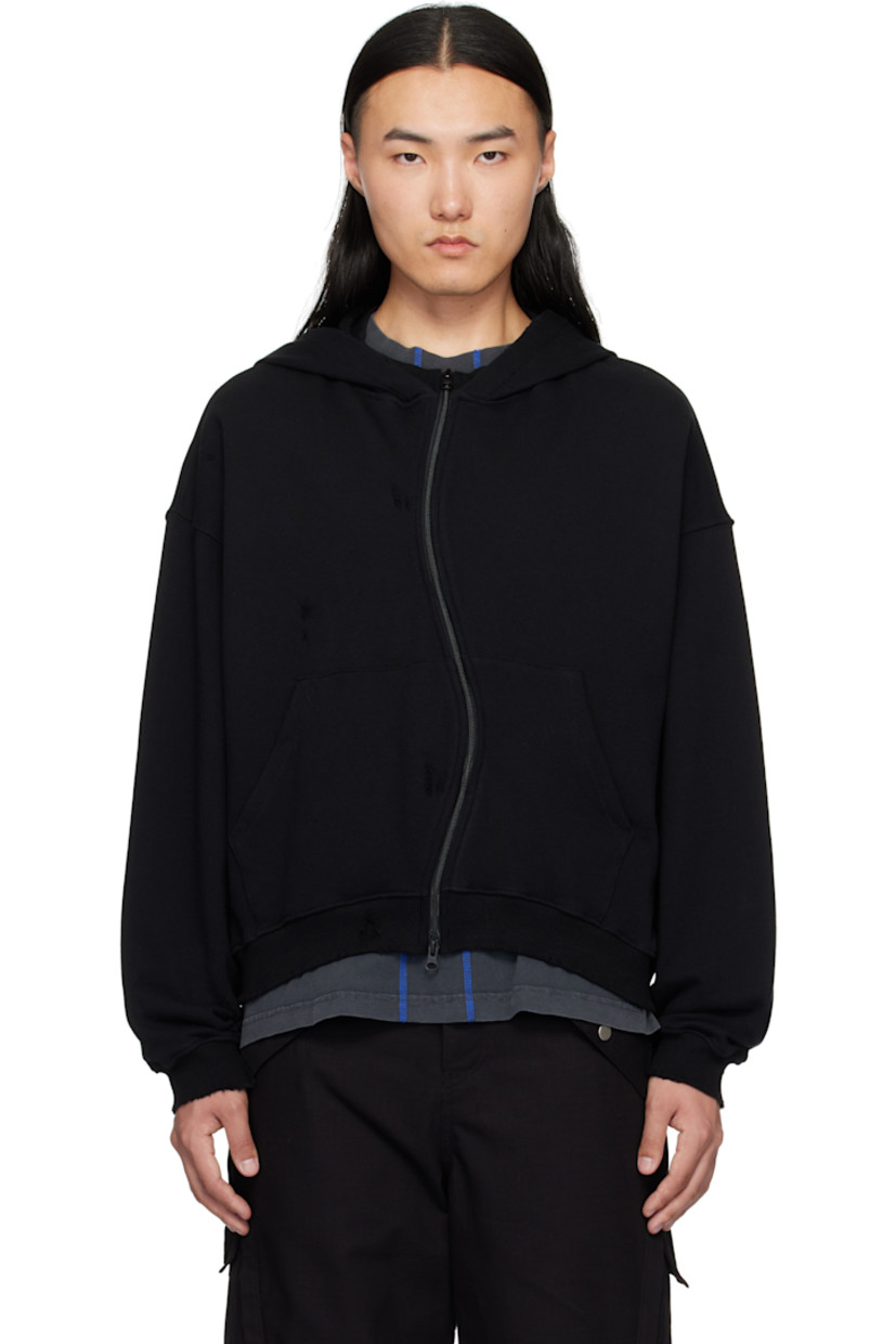 French terry hoodie. Distressing throughout.

· Undulating zip closure
· Patch pockets
· Rib-knit hem and cuffs
· Dropped shoulders

Supplier color: Black
