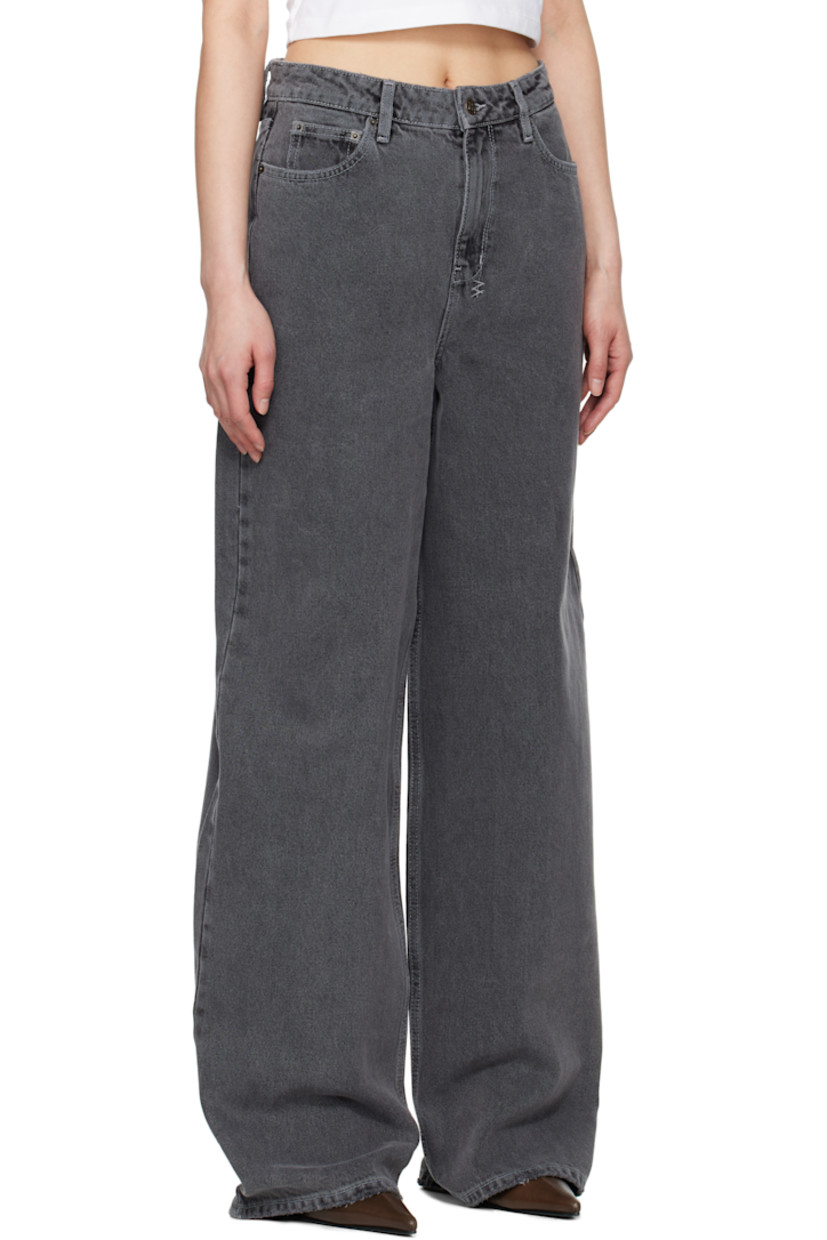 Stonewashed non-stretch denim jeans. Fading throughout.

· Loose-fit and wide-leg 
· Mid-rise 
· Belt loops
· Detachable drawstring belt at waistband
· Five-pocket styling
· Zip fly
· Logo embroidered at back waistband and leg
· Detachable logo flag at back pocket
· Logo-engraved copper-tone hardware

Supplier color: Shade