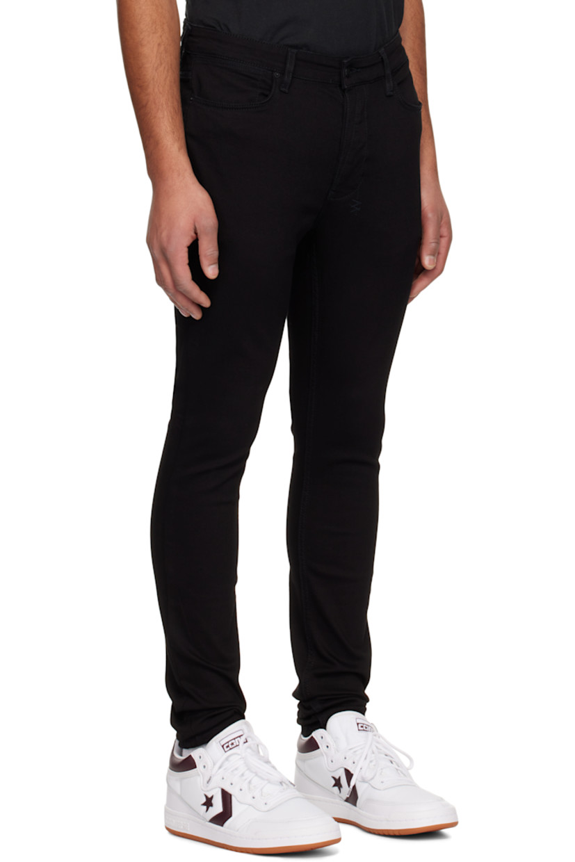 Slim-fit heavyweight stretch denim jeans.

· Mid-rise
· Belt loops
· Five-pocket styling
· Button fly
· Logo graphic embroidered at back waist
· Detachable logo flag at back pocket
· Logo printed at back leg
· Logo-engraved black hardware

Supplier color: Black