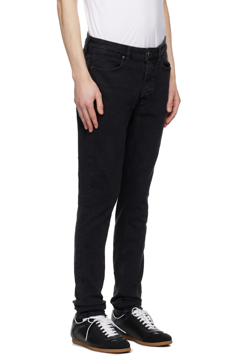Skinny-fit stretch denim jeans. 

· Mid-rise
· Belt loops
· Five-pocket styling
· Button-fly
· Logos embroidered at back 
· Logo embroidered at back leg
· Logo-engraved silver-tone hardware 

Supplier color: Black