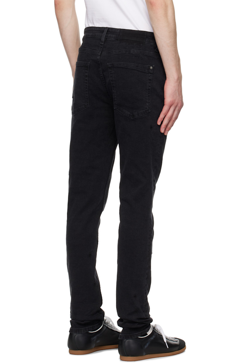 Skinny-fit stretch denim jeans. 

· Mid-rise
· Belt loops
· Five-pocket styling
· Button-fly
· Logos embroidered at back 
· Logo embroidered at back leg
· Logo-engraved silver-tone hardware 

Supplier color: Black