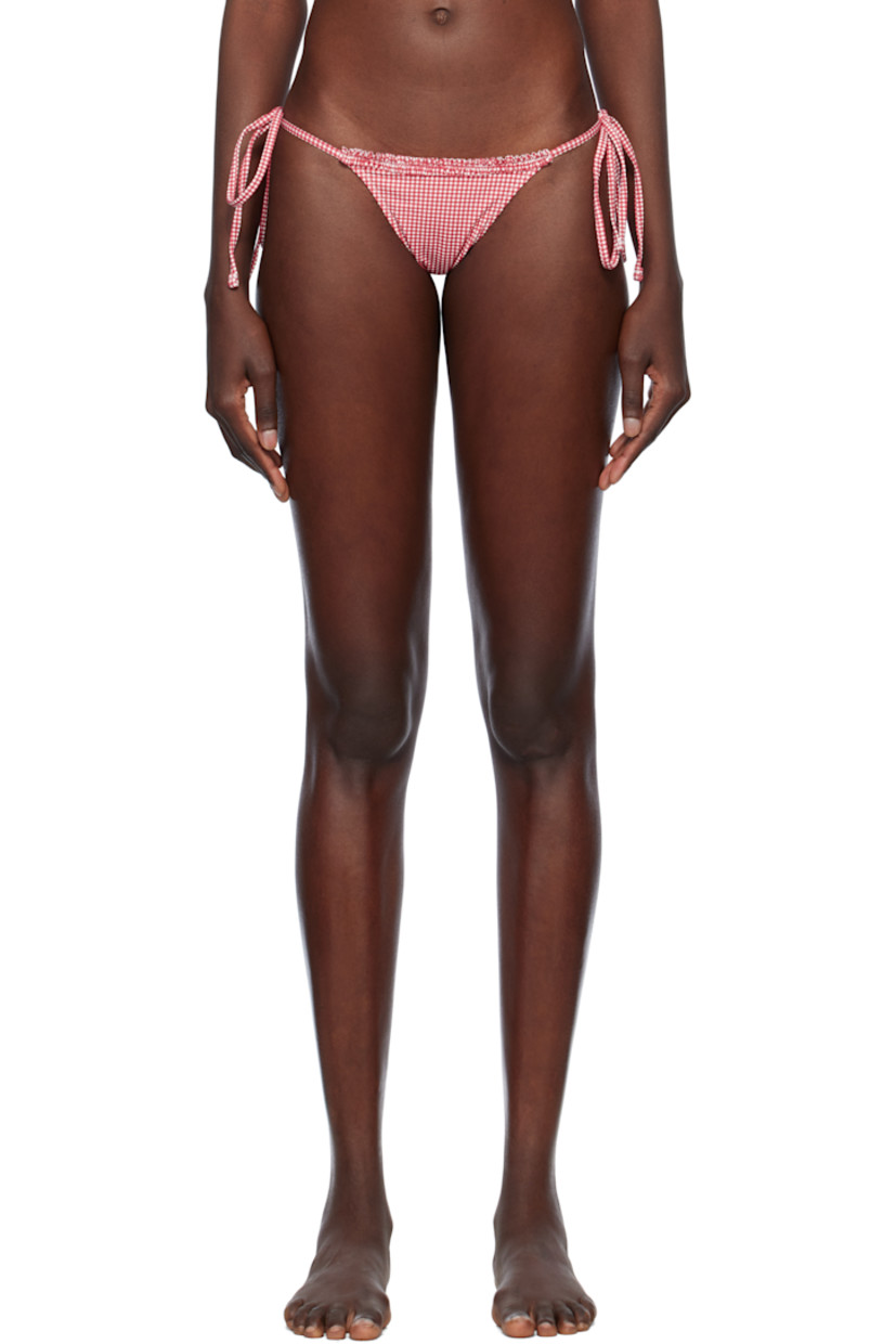 Stretch nylon jersey bikini bottom. Gingham pattern printed throughout.

· Low-rise
· Ruffled trim at waistband
· Self-tie straps at sides
· Fully lined

Supplier color: Ladybug gingham