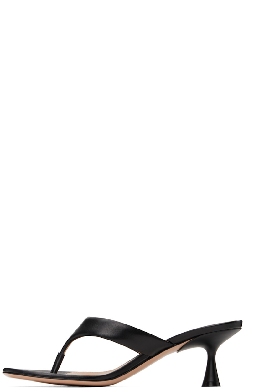 Handcrafted nappa leather heeled sandals in black.

· Open toe
· Thong-style strap at vamp
· Logo hardware at strap
· Logo stamp at padded footbed
· Buffed leather lining
· Lacquered heel with rubber injection
· Polished leather sole
· Gold-tone hardware
· Heel: H2.25"

Supplier color: Black