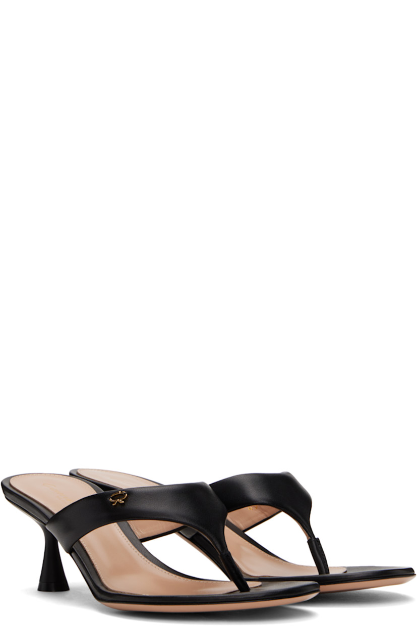 Handcrafted nappa leather heeled sandals in black.

· Open toe
· Thong-style strap at vamp
· Logo hardware at strap
· Logo stamp at padded footbed
· Buffed leather lining
· Lacquered heel with rubber injection
· Polished leather sole
· Gold-tone hardware
· Heel: H2.25"

Supplier color: Black
