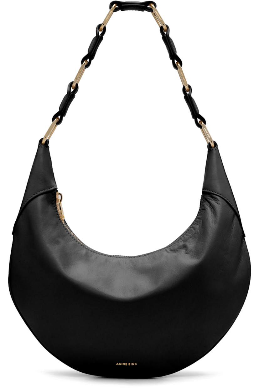 Saffiano lambskin shoulder bag. 

·� Fixed chain link shoulder strap
· Logo printed at face
· Zip closure
· Zip pocket at interior
· Twill lining 
· Gold tone hardware
· H11” x W11.5” x D10”

Supplier color: Black