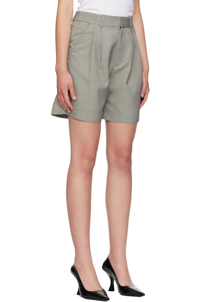 Plain-woven viscose-blend shorts. 

· Houndstooth pattern throughout 
· High-rise 
· Belt loops
· Four-pocket styling
· Zip fly 
· Pleats at front 
· Partial satin lining 

Supplier color: Black/White mini houndstooth