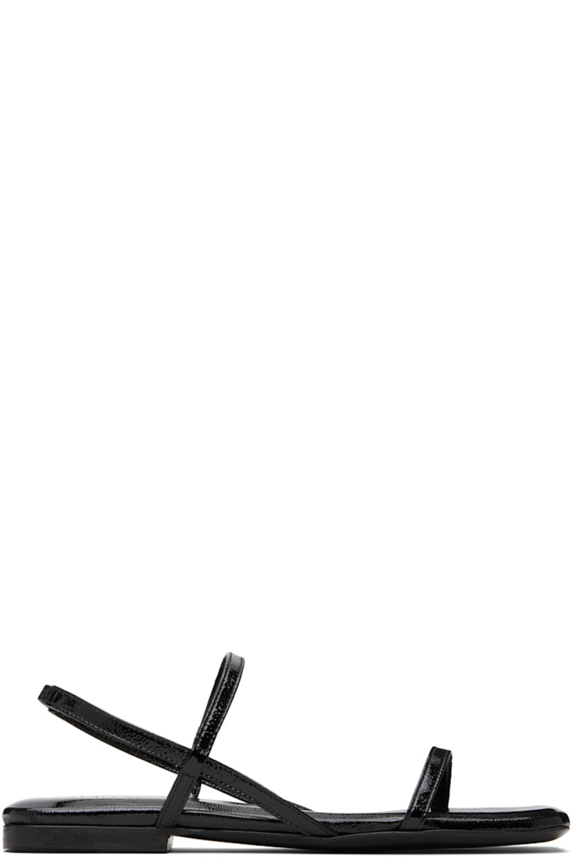 Crinkled patent leather sandals.

· Open square toe
· Straps at vamp
· Partially elasticized slingback strap
· Logo embossed at cushioned footbed
· Polished leather sole

Supplier color: Black