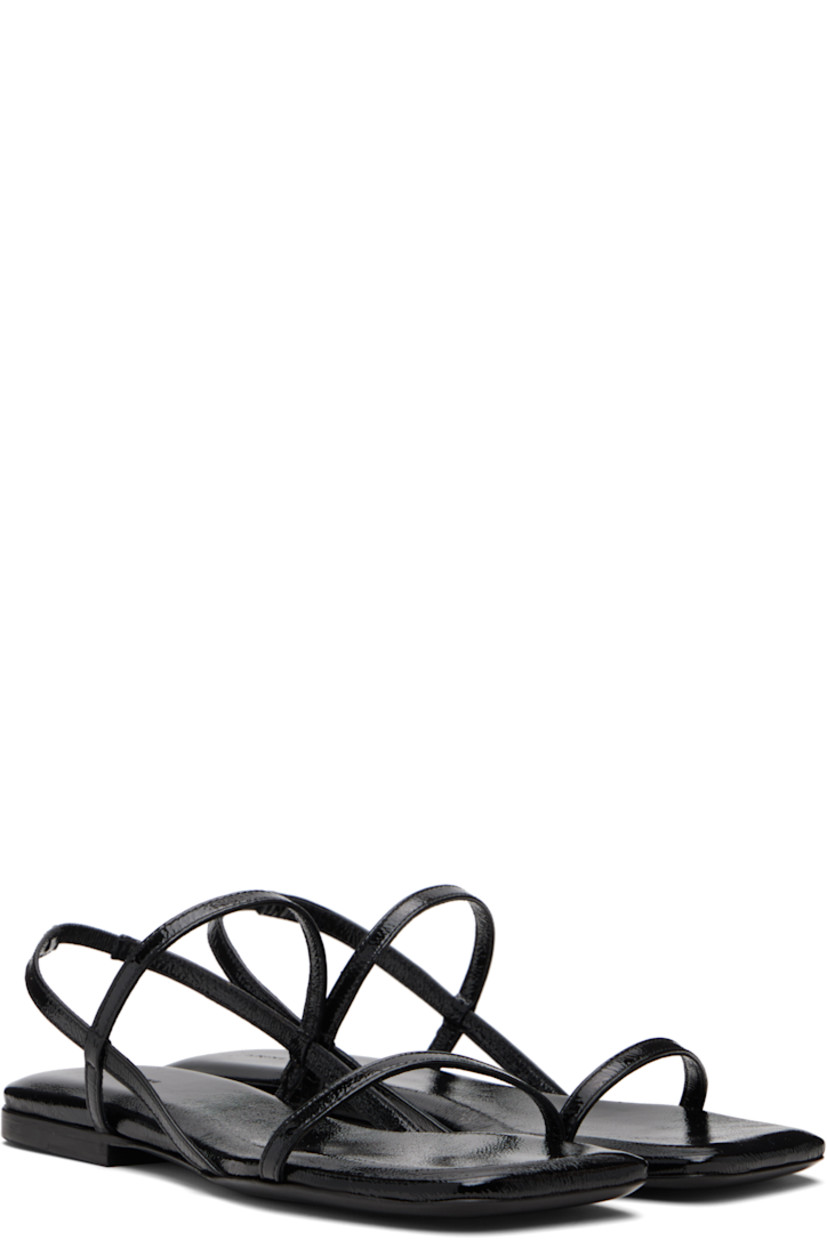 Crinkled patent leather sandals.

· Open square toe
· Straps at vamp
· Partially elasticized slingback strap
· Logo embossed at cushioned footbed
· Polished leather sole

Supplier color: Black