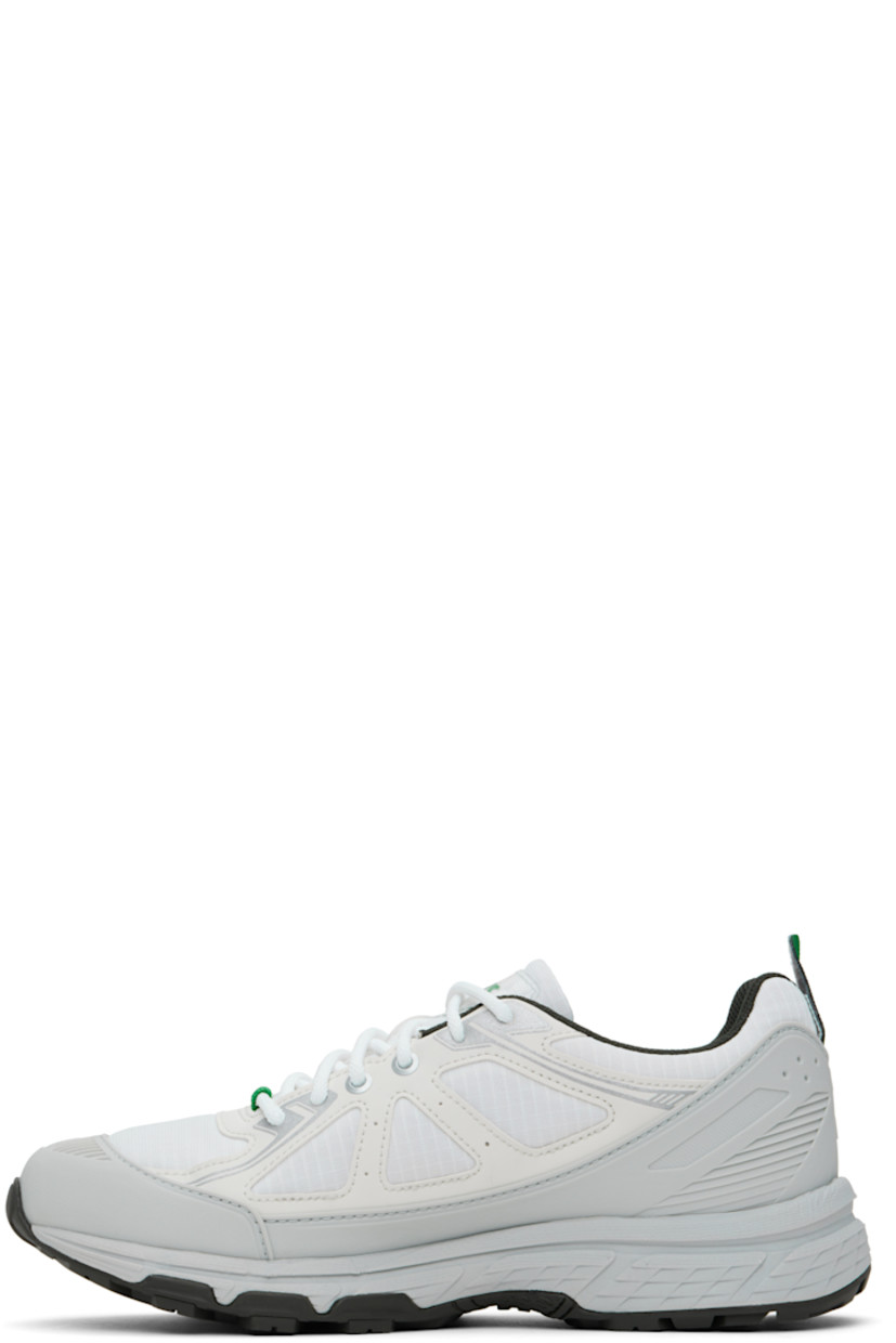 Low-top ripstop sneakers in white and gray. 

· Rubberized trim throughout
· Lace-up closure
· Logo patch at padded tongue 
· Padded collar
· Signature stripes at sides
· Pull-loop at heel counter
· Embossed logo and perforation
· Mesh lining
· Rubber midsole with GEL® technology
· Treaded rubber sole

Part of the Asics x Hidden NY collaboration. 

Supplier color: White/Wasabi