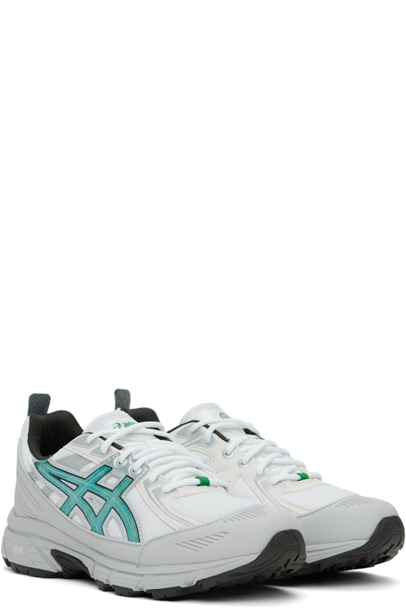 Low-top ripstop sneakers in white and gray. 

· Rubberized trim throughout
· Lace-up closure
· Logo patch at padded tongue 
· Padded collar
· Signature stripes at sides
· Pull-loop at heel counter
· Embossed logo and perforation
· Mesh lining
· Rubber midsole with GEL® technology
· Treaded rubber sole

Part of the Asics x Hidden NY collaboration. 

Supplier color: White/Wasabi