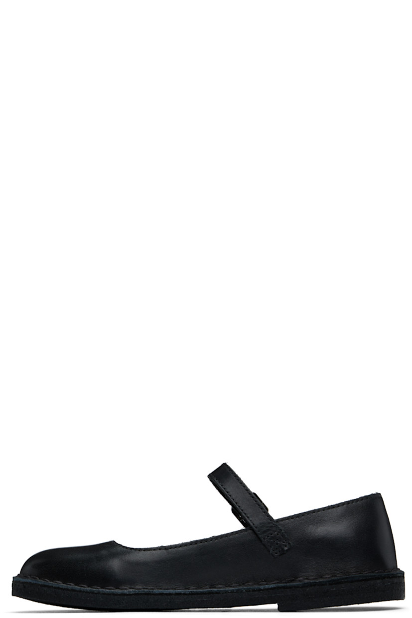 Buffed leather Mary Jane-style ballerina flats in black.

· Pin-buckle strap at vamp
· Suede and buffed leather lining
· Topstitching at welt
· FSC-certified crêpe-rubber sole

Supplier color: Black leather