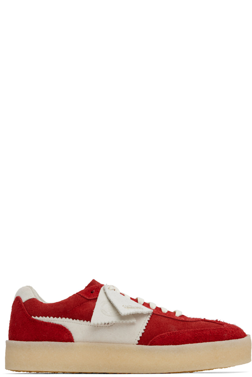 Low-top suede sneakers in red. 

· Logo tags at lace-up closure
· Logo embossed at tongue
· Padded collar
· Appliqué with serrated edges at sides
· Suede lining
· FSC-certified crêpe-rubber sole

Supplier color: Red combination