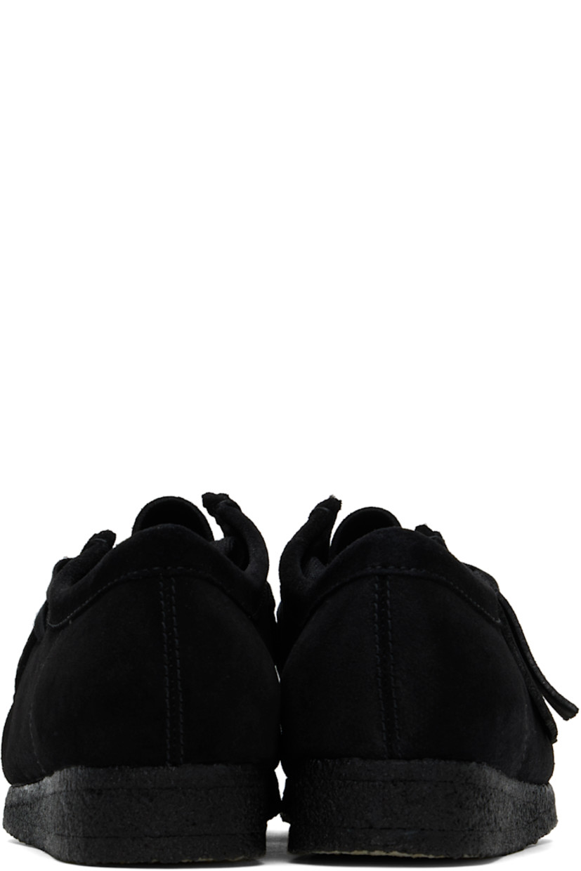 Suede derbys in black.

· Square moc toe
· Logo tags at lace-up closure
· Bellows tongue
· Suede lining
· FSC-certified crepe rubber sole

Supplier color: Black suede