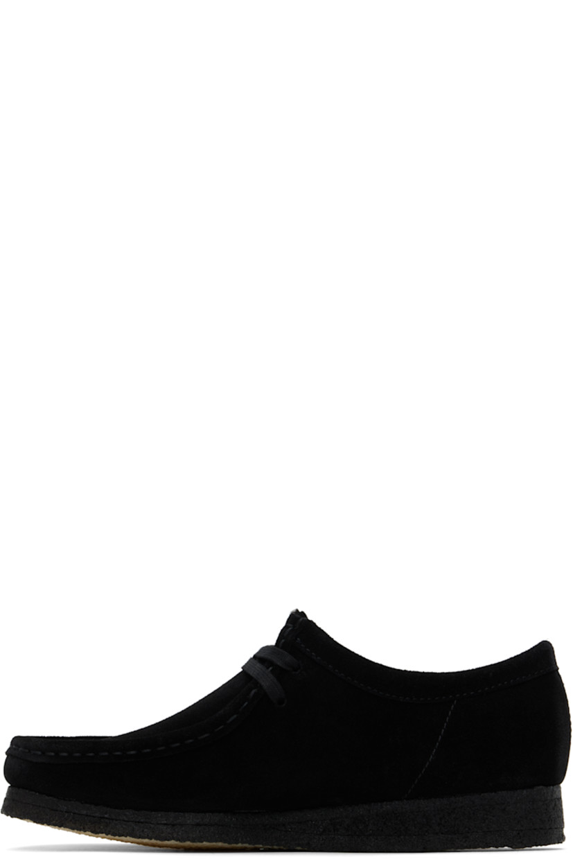Suede derbys in black.

· Square moc toe
· Logo tags at lace-up closure
· Bellows tongue
· Suede lining
· FSC-certified crepe rubber sole

Supplier color: Black suede