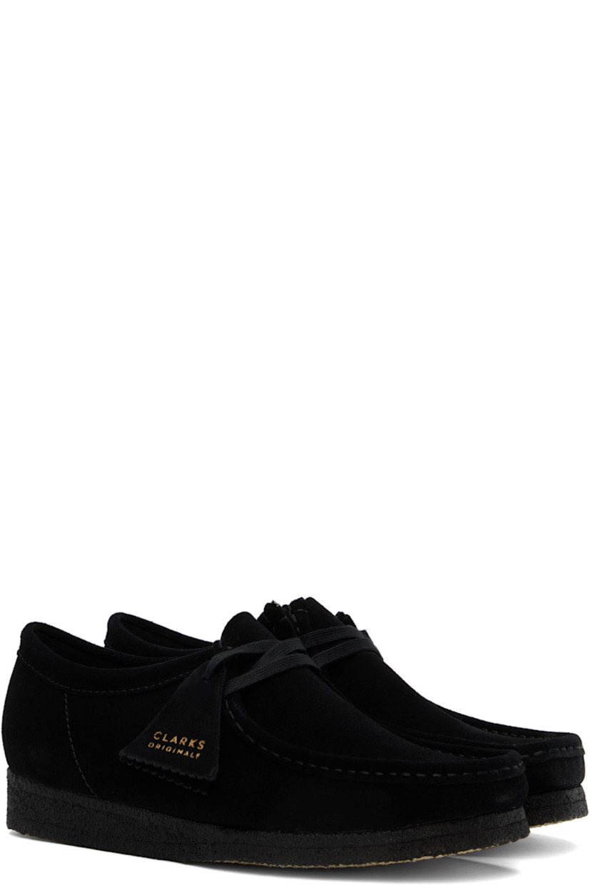 Suede derbys in black.

· Square moc toe
· Logo tags at lace-up closure
· Bellows tongue
· Suede lining
· FSC-certified crepe rubber sole

Supplier color: Black suede