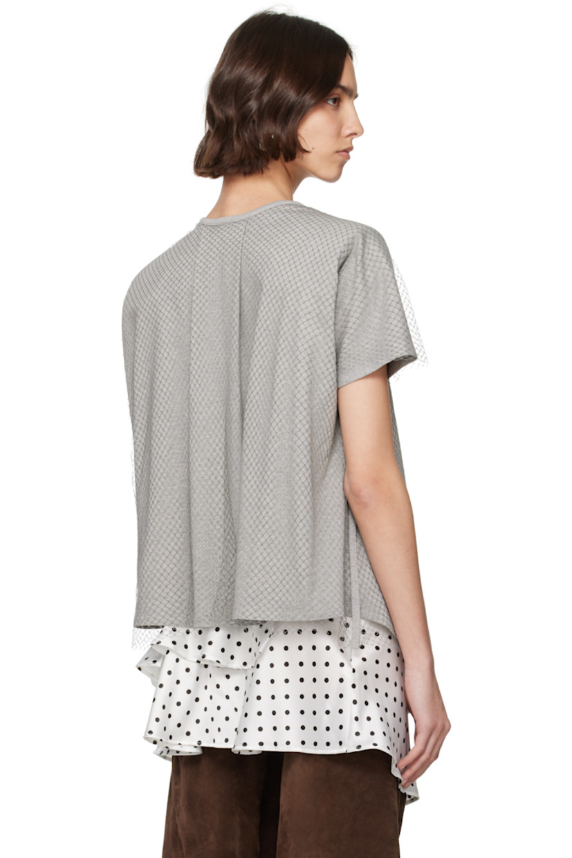 Cotton jersey T-shirt. Draping throughout.

· Nylon fishnet overlay
· Cowl neck
· Ruching at front 
· Asymmetric hem
· Padded saddle shoulders
· Box pleat at back collar

Supplier color: Grey/Baby blue