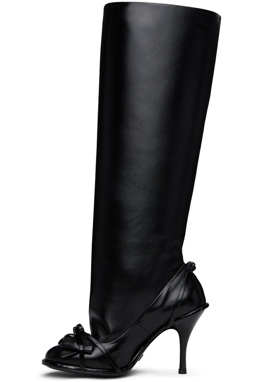 Knee-high nappa leather boots in black.

· Straps and bow accents at vamp
· Bow accent at heel
· Stiletto heel with rubber injection
· Leather sole 
· Heel: H3.5"

Supplier color: Black