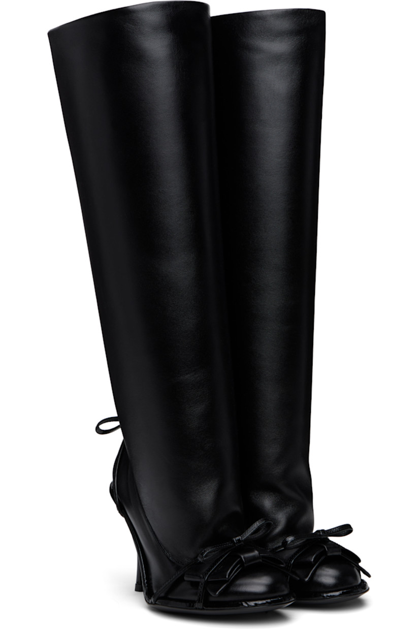 Knee-high nappa leather boots in black.

· Straps and bow accents at vamp
· Bow accent at heel
· Stiletto heel with rubber injection
· Leather sole 
· Heel: H3.5"

Supplier color: Black
