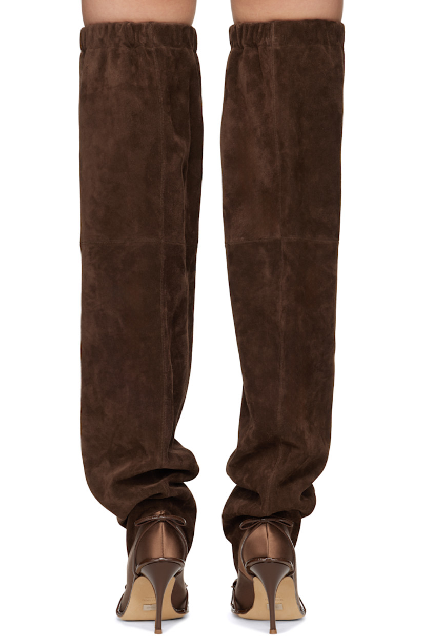 Thigh-high suede and satin boots in brown.

· Straps and bow accents at vamp
· Elasticized collar
· Bow accent at heel
· Stiletto heel with rubber injection
· Leather sole 
· Heel: H4"

Supplier color: Brown