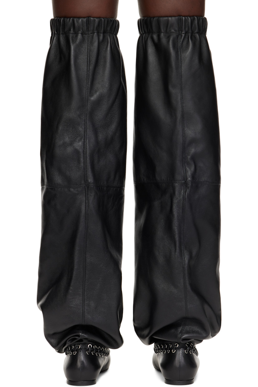 Thigh-high grained nappa leather boots in black.

· Lace-up detailing throughout
· Bow accent at vamp
· Elasticized collar
· Leather sole with rubber injection

Supplier color: Black