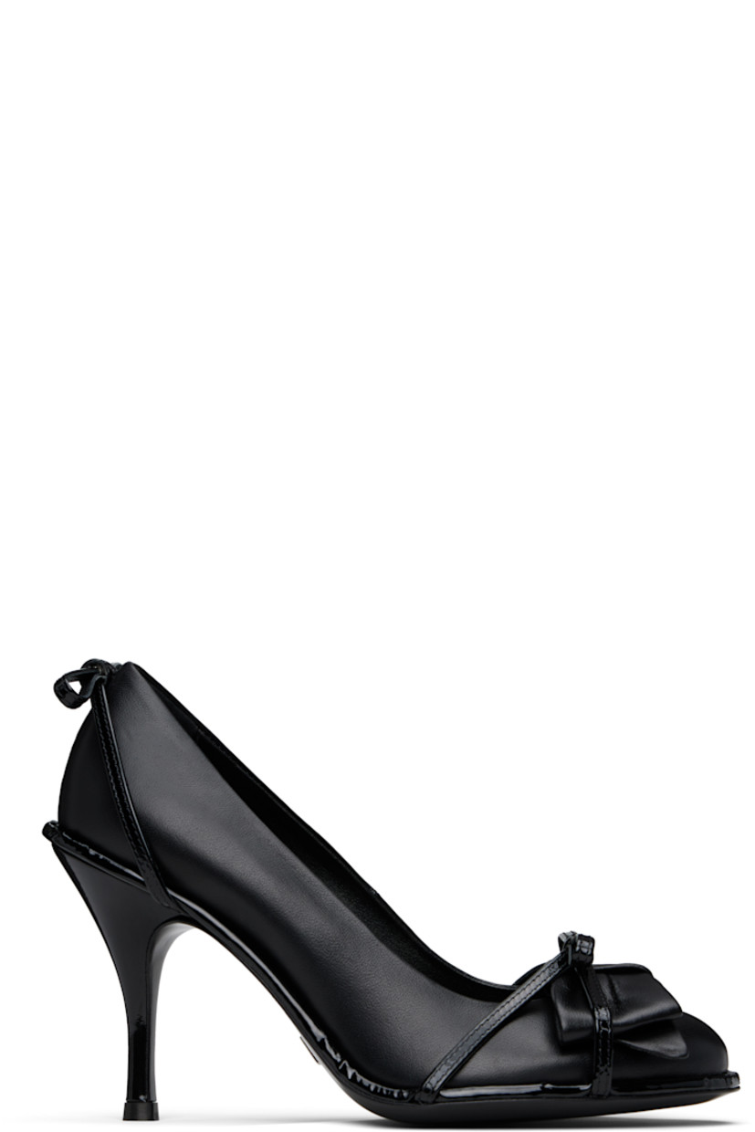 Nappa leather heels in black.

· Straps and bow accents at vamp
· Bow accent at heel
· Stiletto heel with rubber injection
· Leather sole 
· Heel: H3.5"

Supplier color: Black