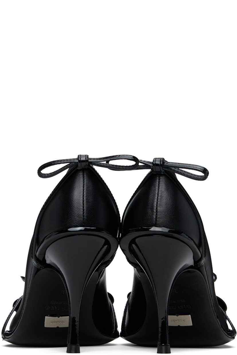 Nappa leather heels in black.

· Straps and bow accents at vamp
· Bow accent at heel
· Stiletto heel with rubber injection
· Leather sole 
· Heel: H3.5"

Supplier color: Black