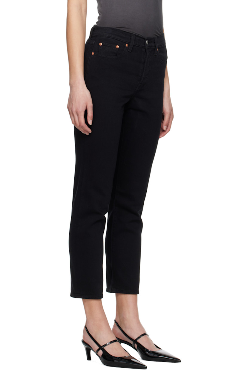 Straight-leg stretch denim jeans.

· High-rise
· Belt loops
· Five-pocket styling
· Button fly
· Leather logo patch at back waistband
· Logo flag at back pocket
· Logo-engraved silver- and copper-tone hardware

Supplier color: Black sprout
