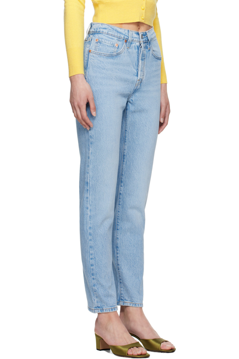 Straight-leg stretch denim jeans. Fading and whiskering throughout.

· High-rise
· Belt loops
· Five-pocket styling
· Button fly
· Leather logo patch at back waistband
· Logo flag at back pocket
· Logo-engraved silver- and copper-tone hardware
· Contrast stitching in tan

Supplier color: Hollow days