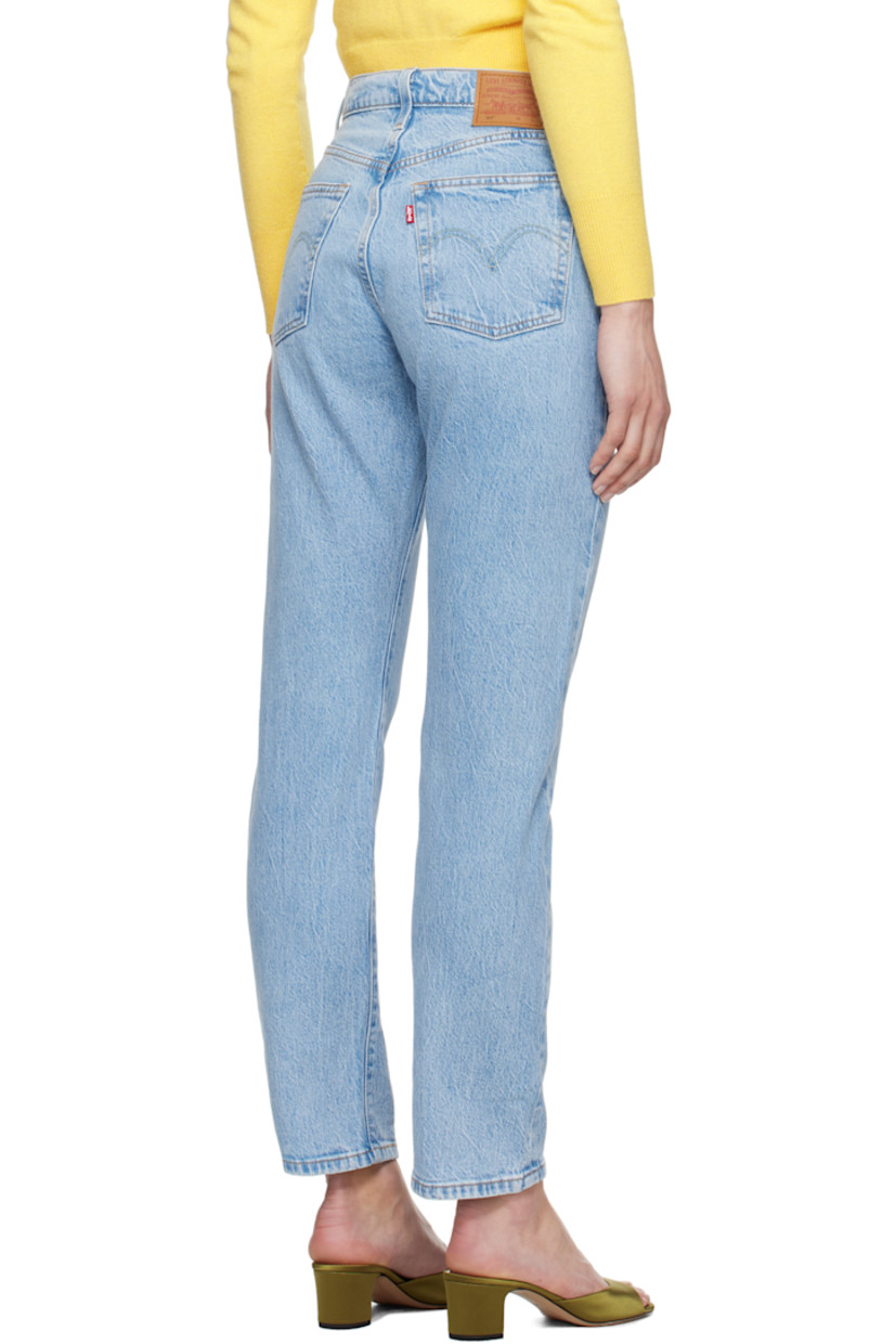 Straight-leg stretch denim jeans. Fading and whiskering throughout.

· High-rise
· Belt loops
· Five-pocket styling
· Button fly
· Leather logo patch at back waistband
· Logo flag at back pocket
· Logo-engraved silver- and copper-tone hardware
· Contrast stitching in tan

Supplier color: Hollow days