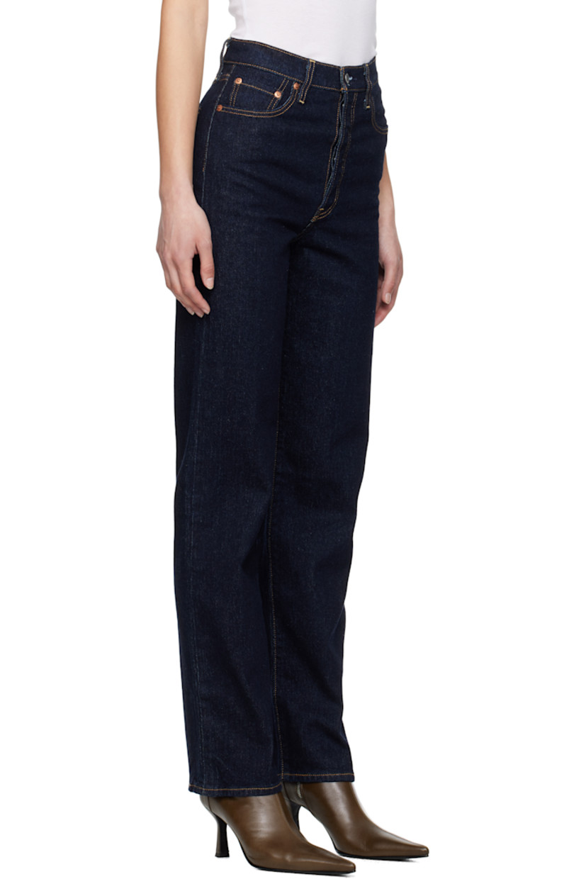 Straight-leg and slim-fit stretch denim jeans.

· High-rise
· Belt loops
· Five-pocket styling
· Button fly
· Leather logo patch at back waistband
· Logo flag at back pocket
· Logo-engraved silver- and copper-tone hardware
· Contrast stitching in tan

Supplier color: Small course