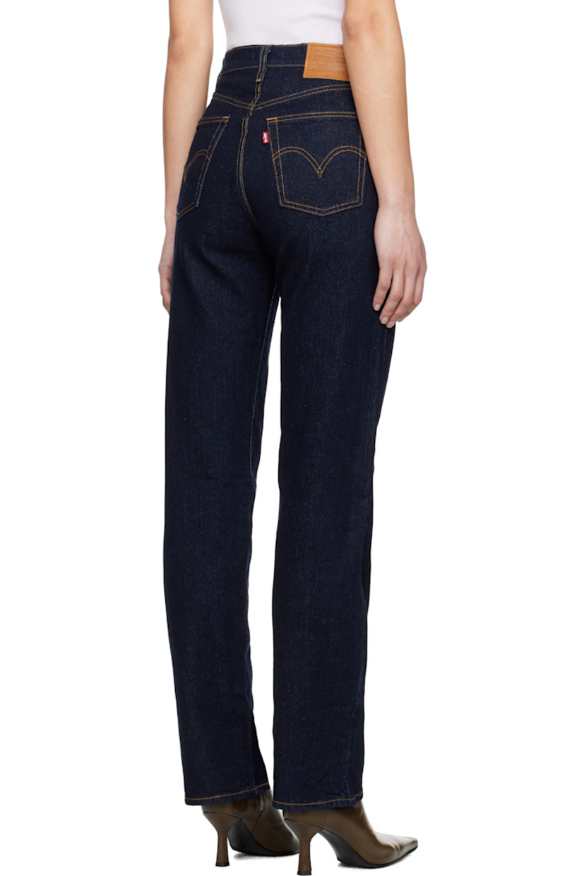 Straight-leg and slim-fit stretch denim jeans.

· High-rise
· Belt loops
· Five-pocket styling
· Button fly
· Leather logo patch at back waistband
· Logo flag at back pocket
· Logo-engraved silver- and copper-tone hardware
· Contrast stitching in tan

Supplier color: Small course