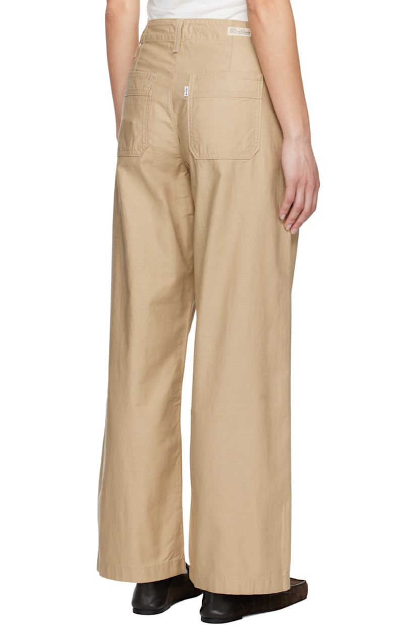 Loose-fit and straight-leg slub cotton twill trousers. 

· Mid-rise
· Belt loops
· Four-pocket styling
· Zip fly
· Logo patch at back waistband
· Logo flag at back pocket
· Logo-engraved silver-tone hardware

Supplier color: Travertine