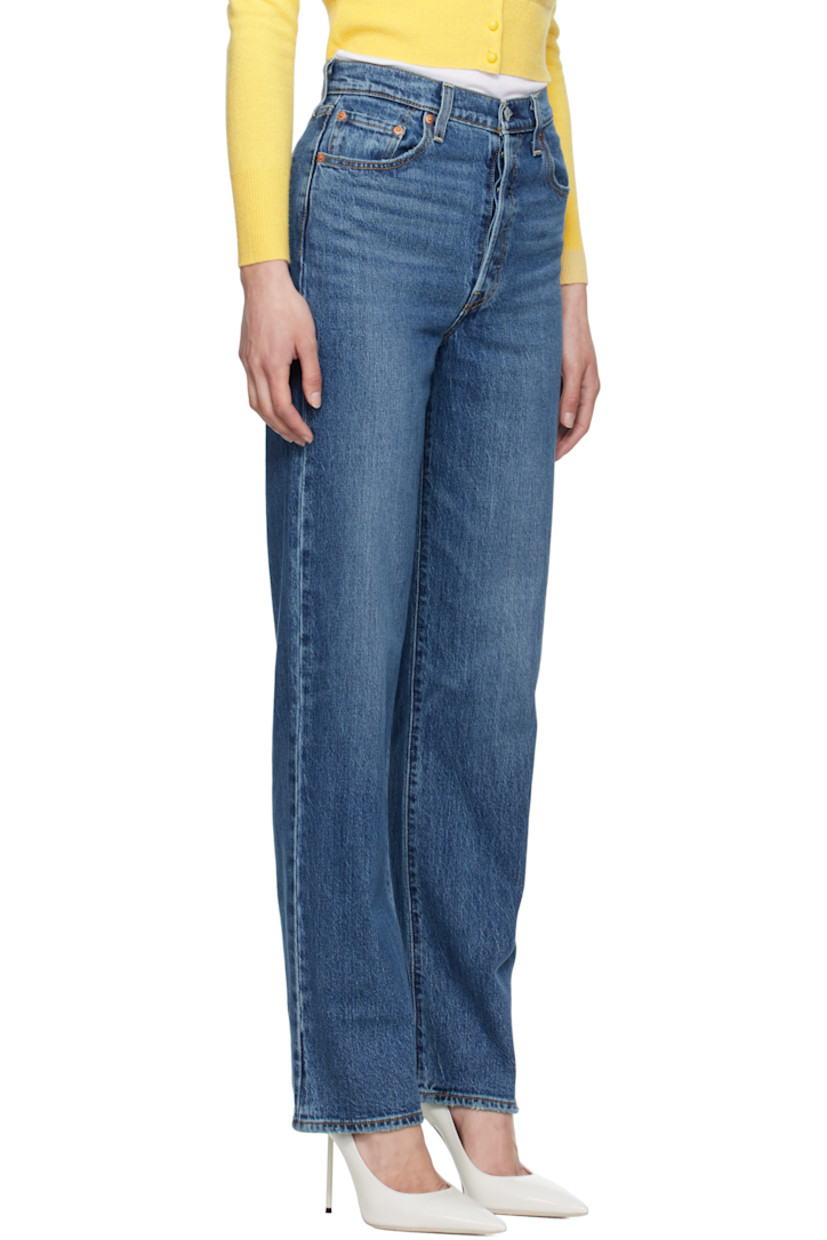 Slim-fit and straight-leg stretch denim jeans. Fading, whiskering, and subtle distressing throughout.

· High-rise
· Belt loops
· Five-pocket styling
· Button fly
· Leather logo patch at back waistband
· Logo flag at back pocket
· Logo-engraved silver- and copper-tone hardware
· Contrast stitching in tan

Supplier color: Valley view