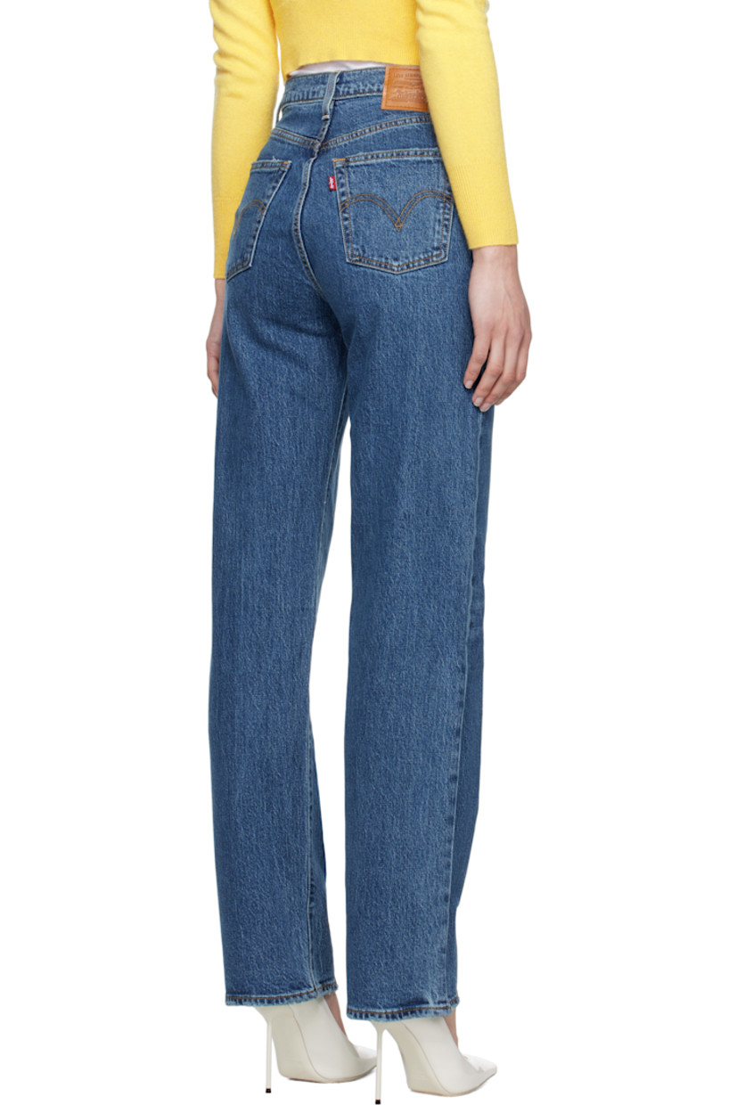 Slim-fit and straight-leg stretch denim jeans. Fading, whiskering, and subtle distressing throughout.

· High-rise
· Belt loops
· Five-pocket styling
· Button fly
· Leather logo patch at back waistband
· Logo flag at back pocket
· Logo-engraved silver- and copper-tone hardware
· Contrast stitching in tan

Supplier color: Valley view