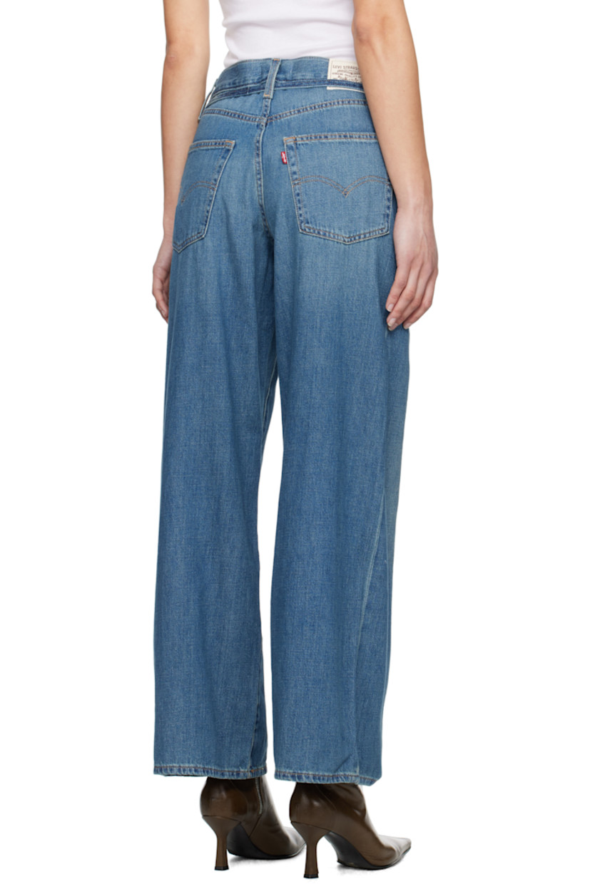 Lightweight non-stretch cotton- and linen-blend denim jeans. Fading and whiskering throughout.

· Oversized and straight-leg 
· Mid-rise
· Belt loops
· Detachable self-tie belt
· Five-pocket styling
· Zip fly
· Logo patch at back waistband
· Logo flag at back pocket
· Logo-engraved silver- and copper-tone hardware
· Contrast stitching in tan

Supplier color: Stop flaxing