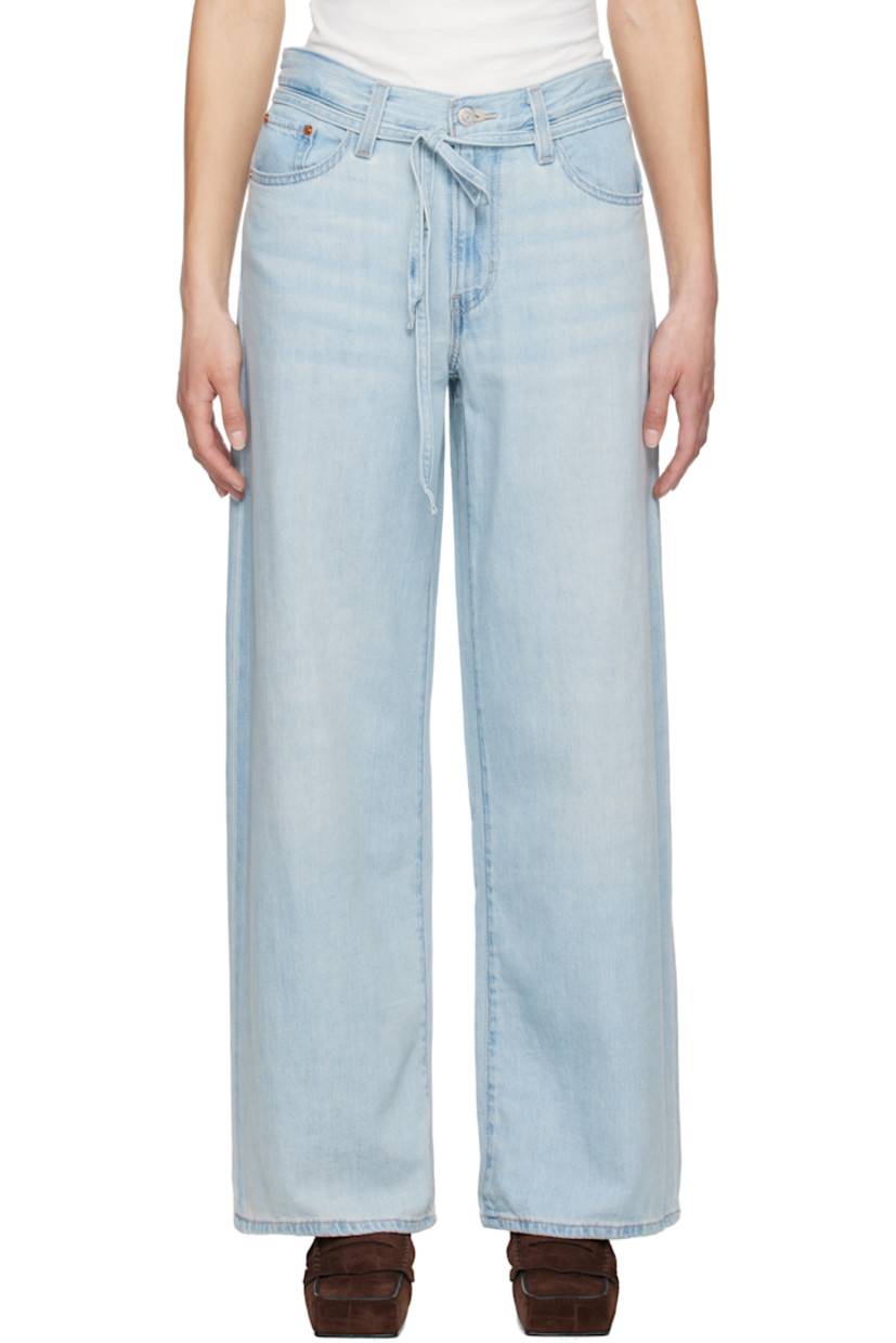Lightweight non-stretch cotton- and linen-blend denim jeans. Fading and whiskering throughout.

· Oversized and straight-leg 
· Mid-rise
· Belt loops
· Detachable self-tie belt
· Five-pocket styling
· Zip fly
· Logo patch at back waistband
· Logo flag at back pocket
· Logo-engraved silver- and copper-tone hardware

Supplier color: Luxury trip