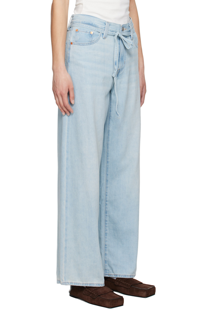 Lightweight non-stretch cotton- and linen-blend denim jeans. Fading and whiskering throughout.

· Oversized and straight-leg 
· Mid-rise
· Belt loops
· Detachable self-tie belt
· Five-pocket styling
· Zip fly
· Logo patch at back waistband
· Logo flag at back pocket
· Logo-engraved silver- and copper-tone hardware

Supplier color: Luxury trip
