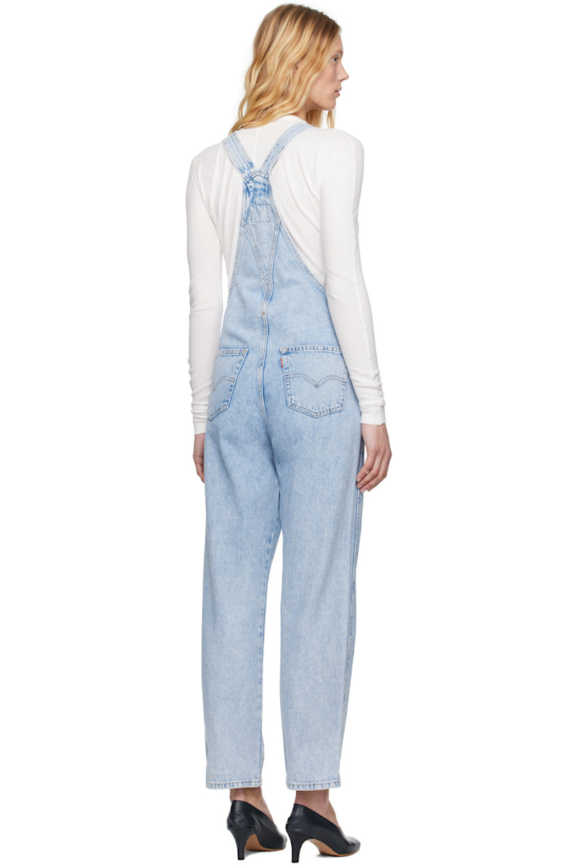 Straight-leg non-stretch denim overalls. Fading throughout.

· Square neck
· Patch pocket with logo patch at chest
· Four-pocket styling
· Mock fly
· Button fastening at outseams
· Adjustable shoulder straps
· Logo flag at back pocket
· Logo-engraved silver-tone hardware

Supplier color: Mesh intentions