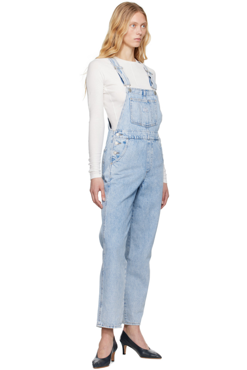Straight-leg non-stretch denim overalls. Fading throughout.

· Square neck
· Patch pocket with logo patch at chest
· Four-pocket styling
· Mock fly
· Button fastening at outseams
· Adjustable shoulder straps
· Logo flag at back pocket
· Logo-engraved silver-tone hardware

Supplier color: Mesh intentions