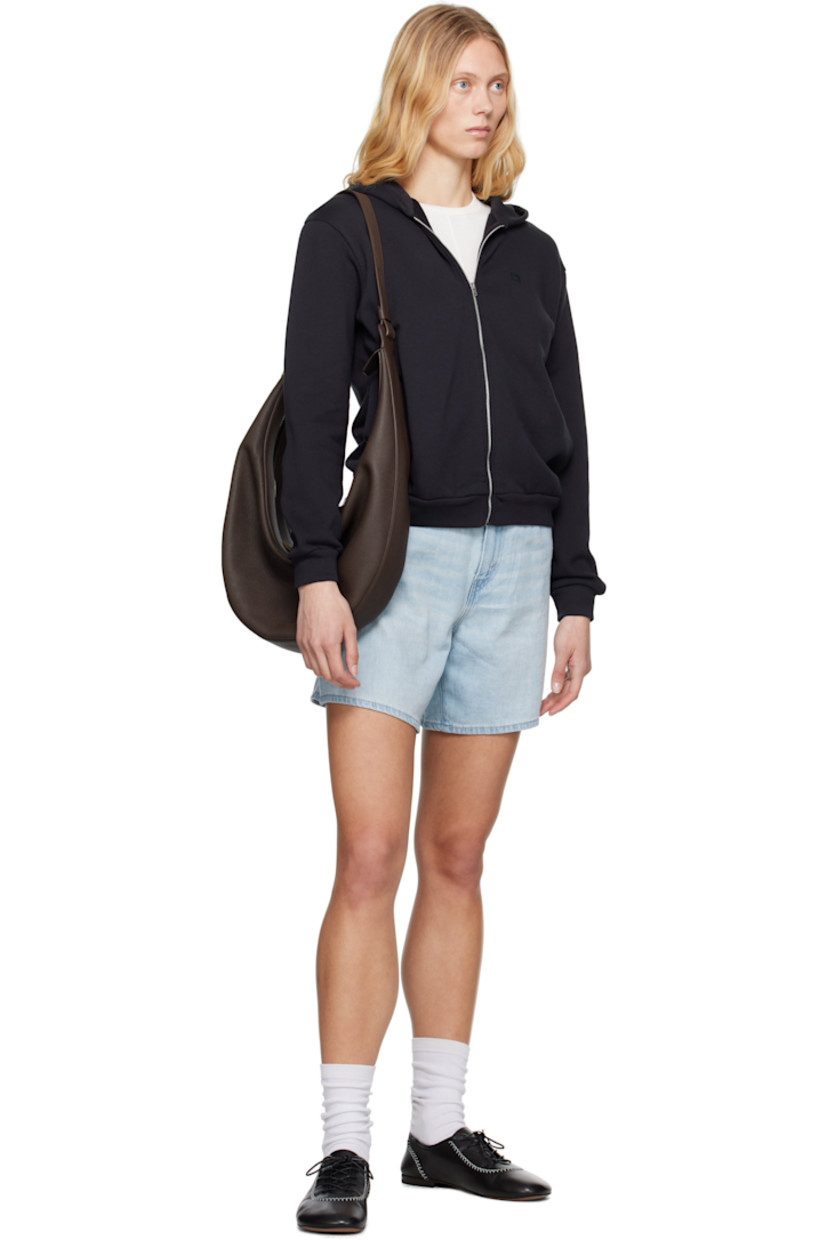 Non-stretch cotton- and linen-blend denim shorts. Fading and whiskering throughout.

· Baggy-fit and lightweight
· High-rise
· Belt loops
· Five-pocket styling
· Zip fly
· Logo patch at back waistband
· Logo flag at back pocket
· Logo-engraved silver- and copper-tone hardware
· Contrast stitching in beige

Supplier color: Luxury trip