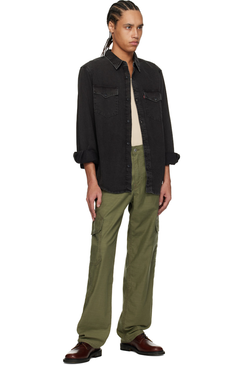 Non-stretch denim overshirt. Fading throughout. 

· Spread collar
· Button closure
· Flap pockets at chest
· Logo flag at chest pocket
· Shirttail hem
· Single-button barrel cuffs

Supplier color: Cava washed black/Grey