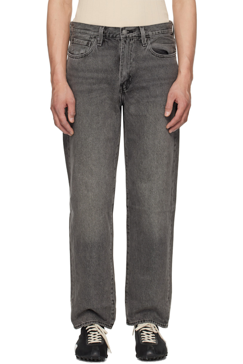 Loose-fit and straight-leg non-stretch denim jeans. Fading and whiskering throughout. 

· Mid-rise
· Belt loops 
· Five-pocket styling 
· Zip fly 
· Leather logo patch at back waistband 
· Logo flag at back pocket
· Logo-engraved silver-tone hardware

Supplier color: Block party