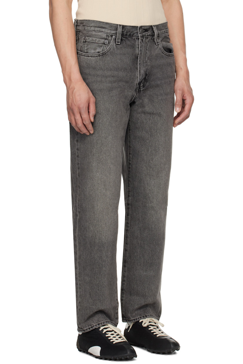 Loose-fit and straight-leg non-stretch denim jeans. Fading and whiskering throughout. 

· Mid-rise
· Belt loops 
· Five-pocket styling 
· Zip fly 
· Leather logo patch at back waistband 
· Logo flag at back pocket
· Logo-engraved silver-tone hardware

Supplier color: Block party