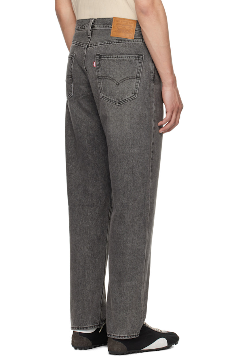 Loose-fit and straight-leg non-stretch denim jeans. Fading and whiskering throughout. 

· Mid-rise
· Belt loops 
· Five-pocket styling 
· Zip fly 
· Leather logo patch at back waistband 
· Logo flag at back pocket
· Logo-engraved silver-tone hardware

Supplier color: Block party