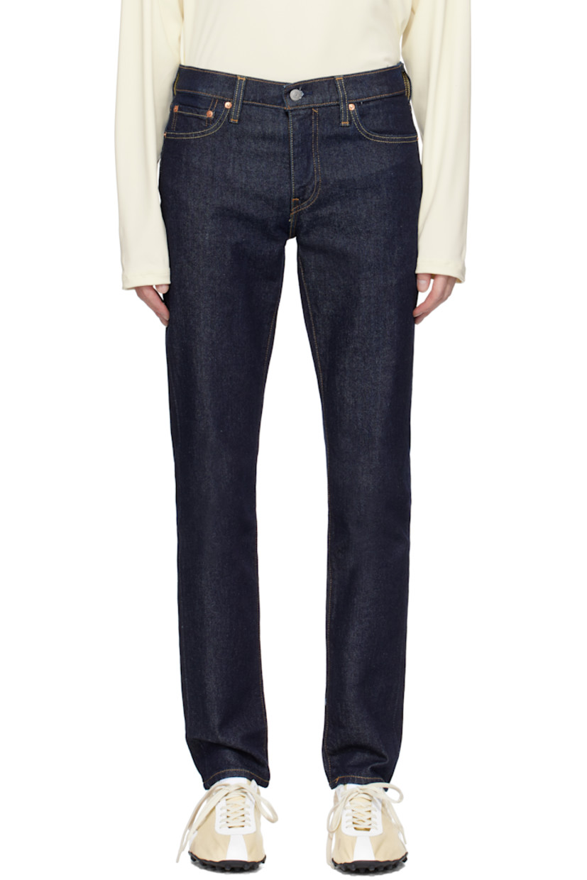 Slim-fit Levi's® Flex Eco Performance stretch denim jeans.

· Low-rise
· Belt loops
· Five-pocket styling
· Zip fly
· Leather logo patch at back waistband
· Logo flag at back pocket
· Logo-engraved silver- and copper-tone hardware
· Contrast stitching in tan

Supplier color: Midnight rinse